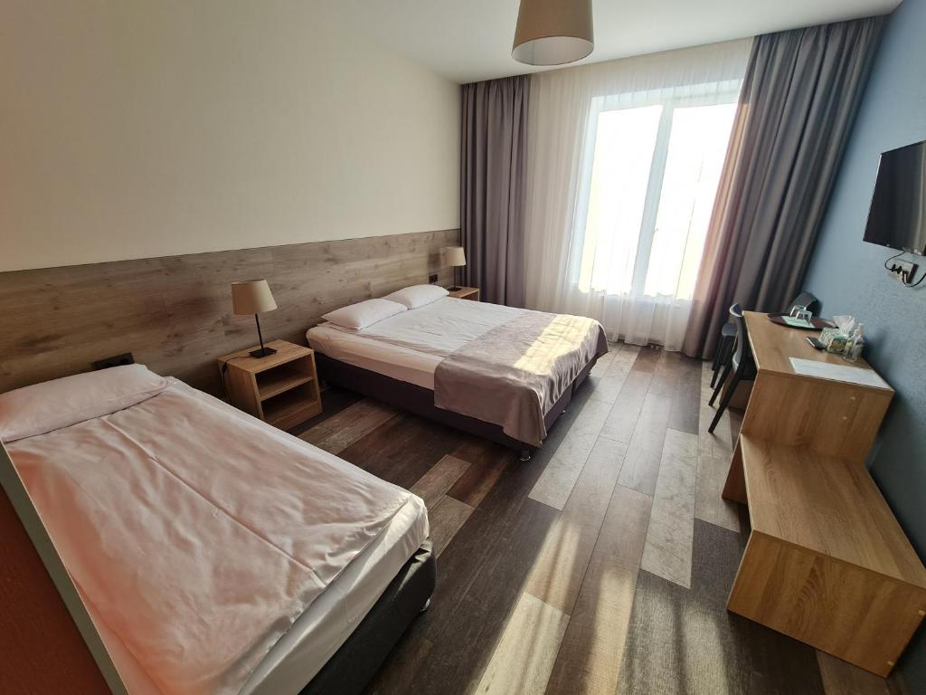 Отель веряжский великий новгород. Отель в великом новгороде 65home. 65home каберова-власьевская ул 65 великий новгород. 65 home великий новгород. 65 home великий.