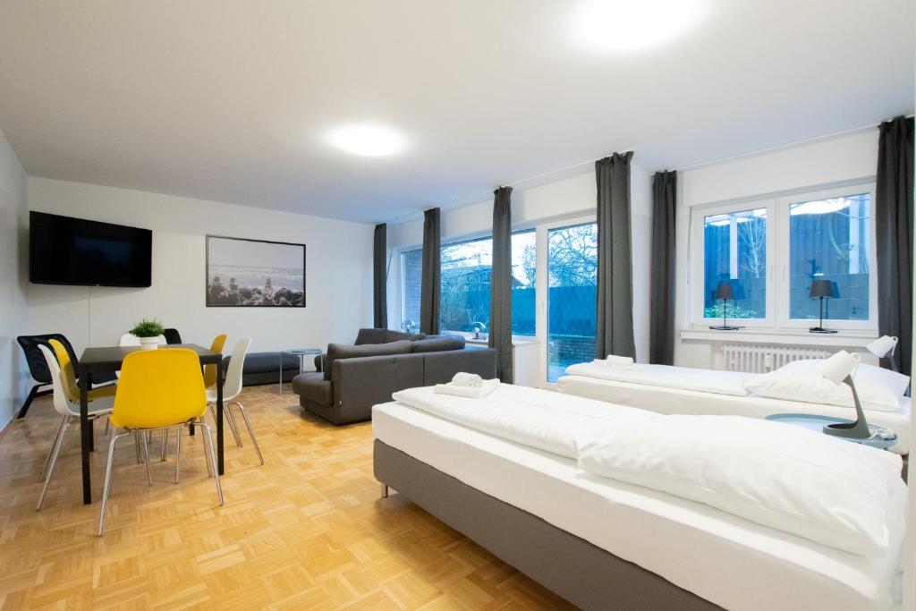 RAJ Living - 1 , 3 and 4 Room Apartments - 20 min MESSE DUS & Airport DUS