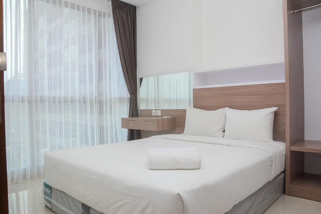 Modern 1BR at Ciputra World 2 Apartment By Travelio, Jakarta
