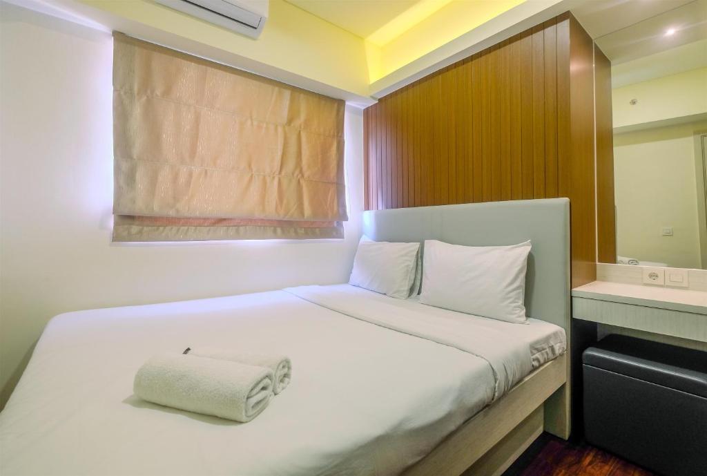 New Furnished and Minimalist 3BR at Meikarta Apartment By Travelio, Cikarang