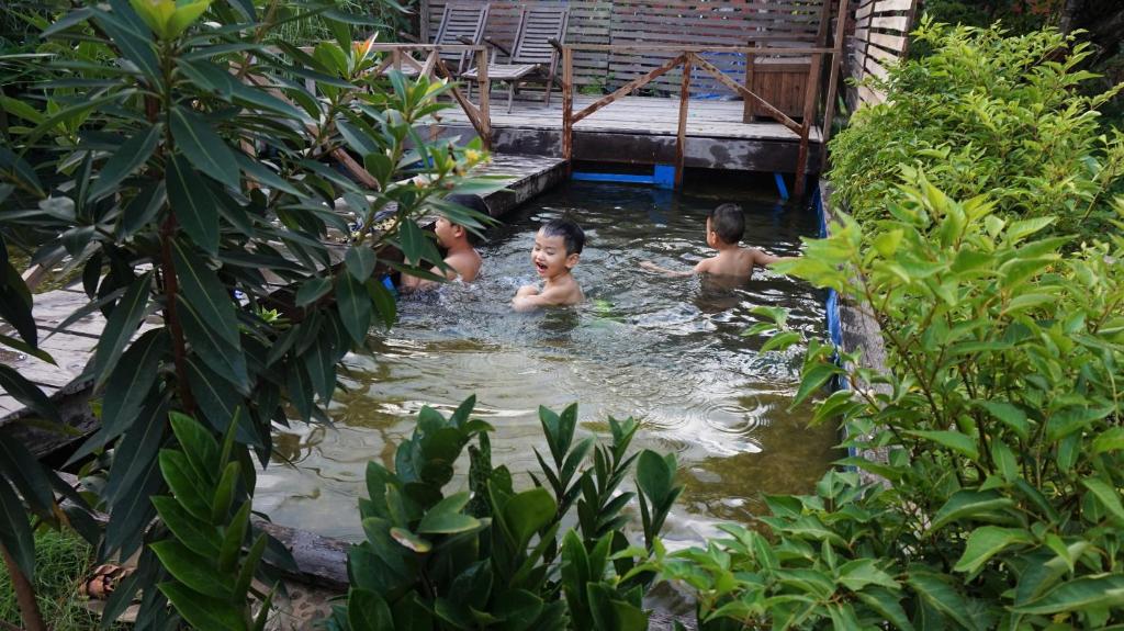 A cozy cabin and natural pool in Tay Ninh photo