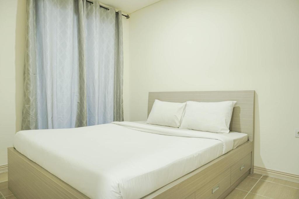 Comfy and Modern 2BR at Meikarta Apartment By Travelio, Cikarang