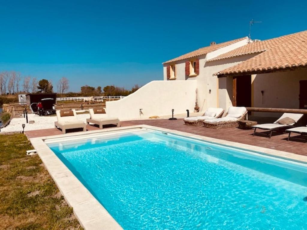 Mas Lou Caloun - Chambre d'Hote face a la piscine en Camargue - Les Saintes Maries de la Mer photo