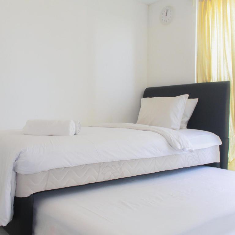 Simply Minimalist Studio at Casa De Parco Apartment By Travelio, Tangerang