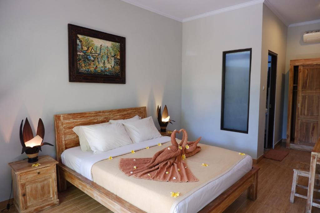 Kamar penginapan di Kubudiuma Villas.