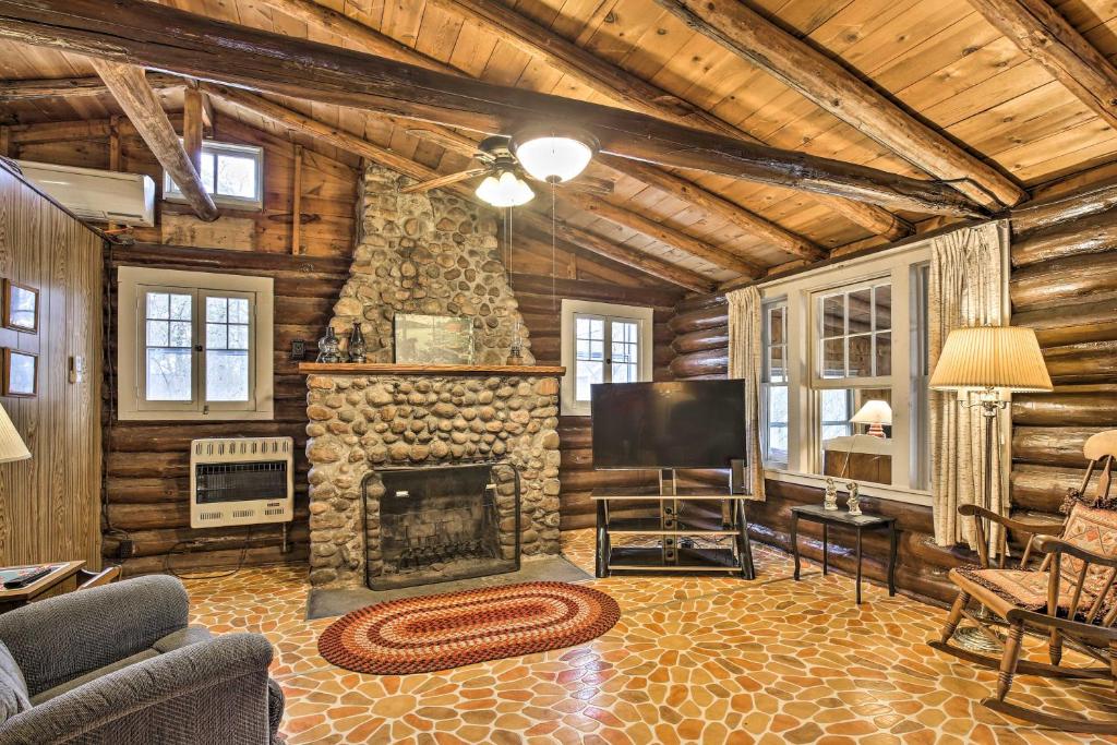 Lakefront 1930s Log Cabin with Dock and Fire Pit!, Rice Lake