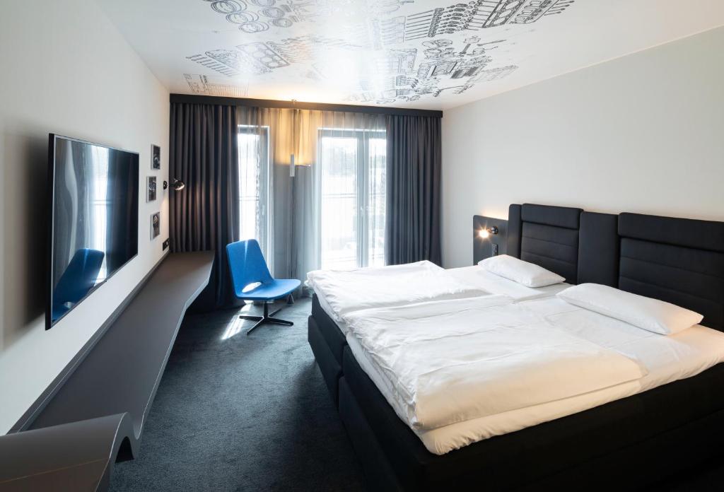 V8 Hotel Köln at MOTORWORLD — Hotel rooms in Cologne, North Rhine-Westphalia