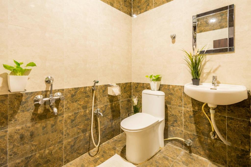 Capital O 26941 Hotel Palm International photo