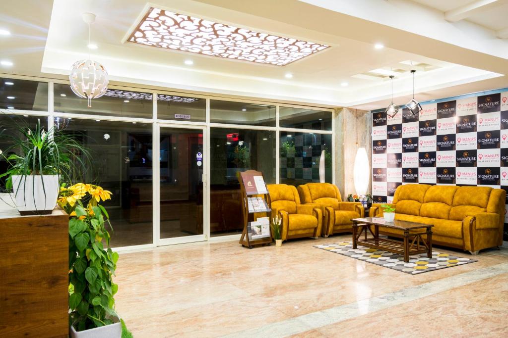 Capital O 26941 Hotel Palm International photo