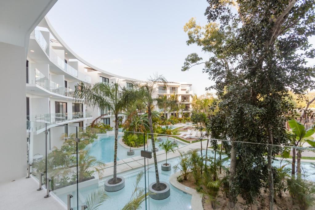 Your place in Town with Pool, coworking and gym located at Central Park Lagunas, Tulum