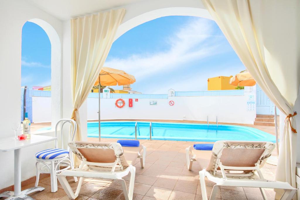 Neptuno Bungalows - Adults Only photo