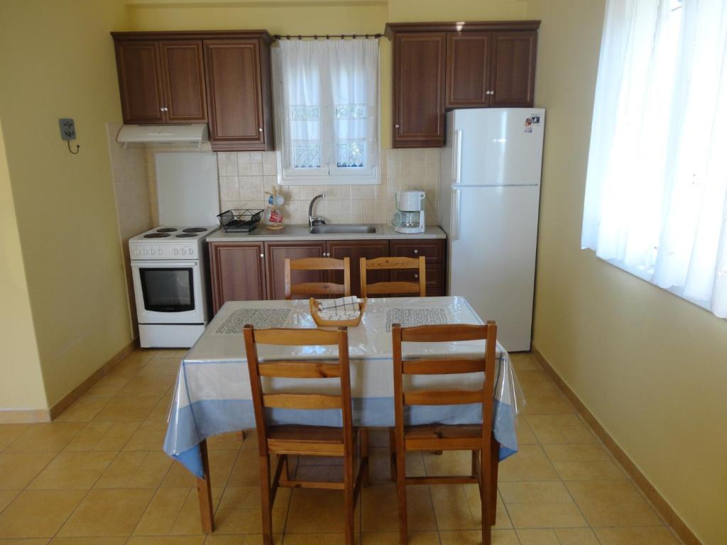 Kitchen, Akti Zaga Apartments in Koroni