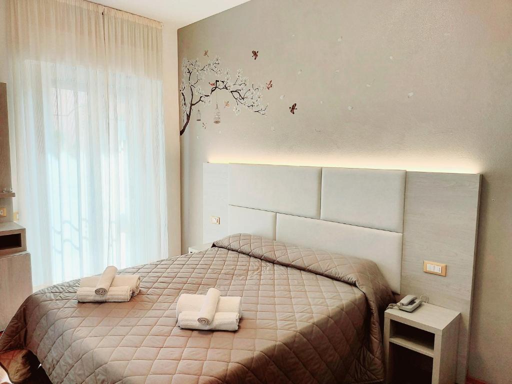 Hotel Monica — Pokoje in Rimini, Emilia-Romania