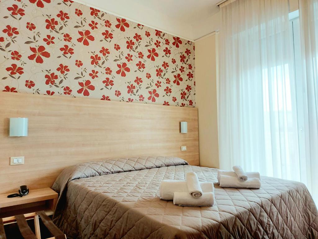 Hotel Monica — Pokoje in Rimini, Emilia-Romania