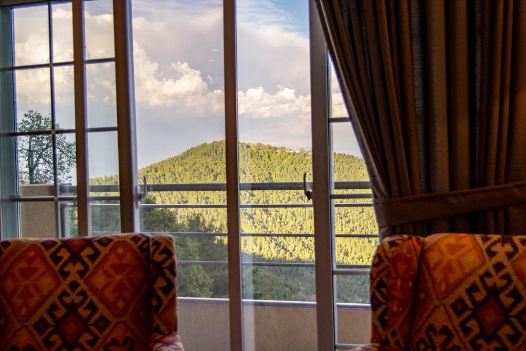 The Roomy Lodge, Murree photo