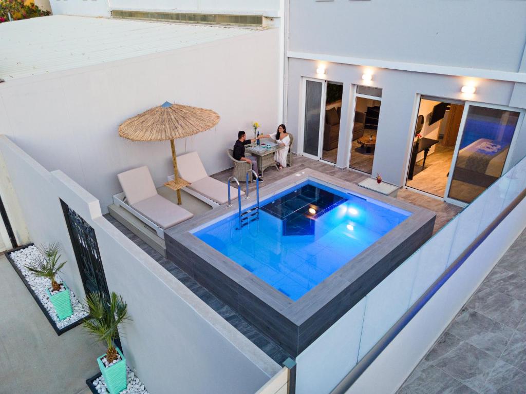 Delfina Boutique Hotel — Swimming pool in Georgioupolis