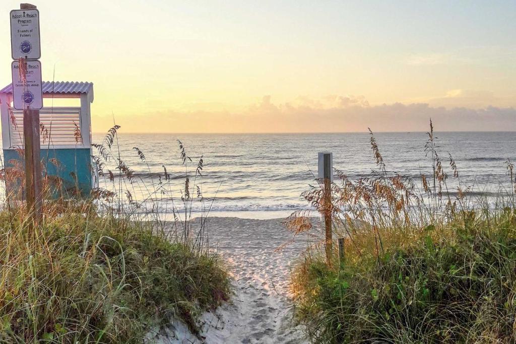 Condo with Balcony and Pool Walk to 2 Beach Accesses! photo