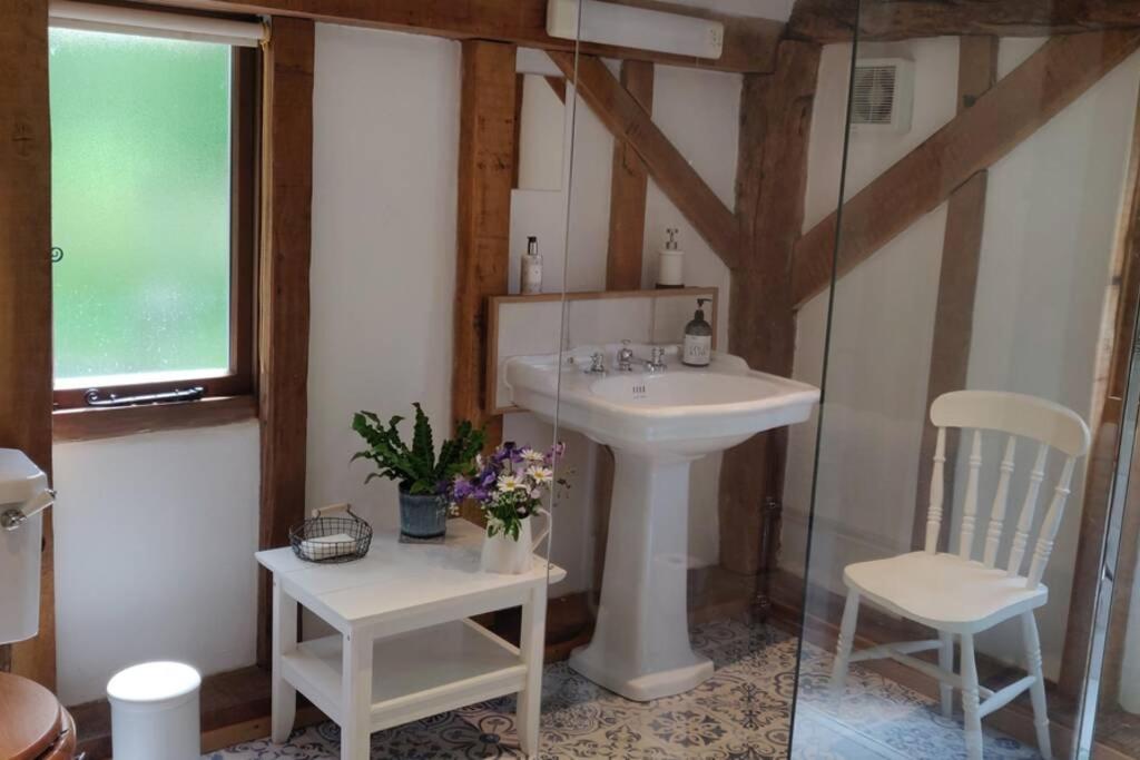 Cosy listed barn in peaceful country village photo