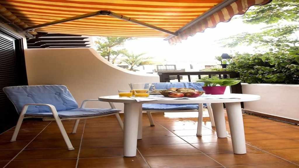 Apartamento con jardin y piscina B photo