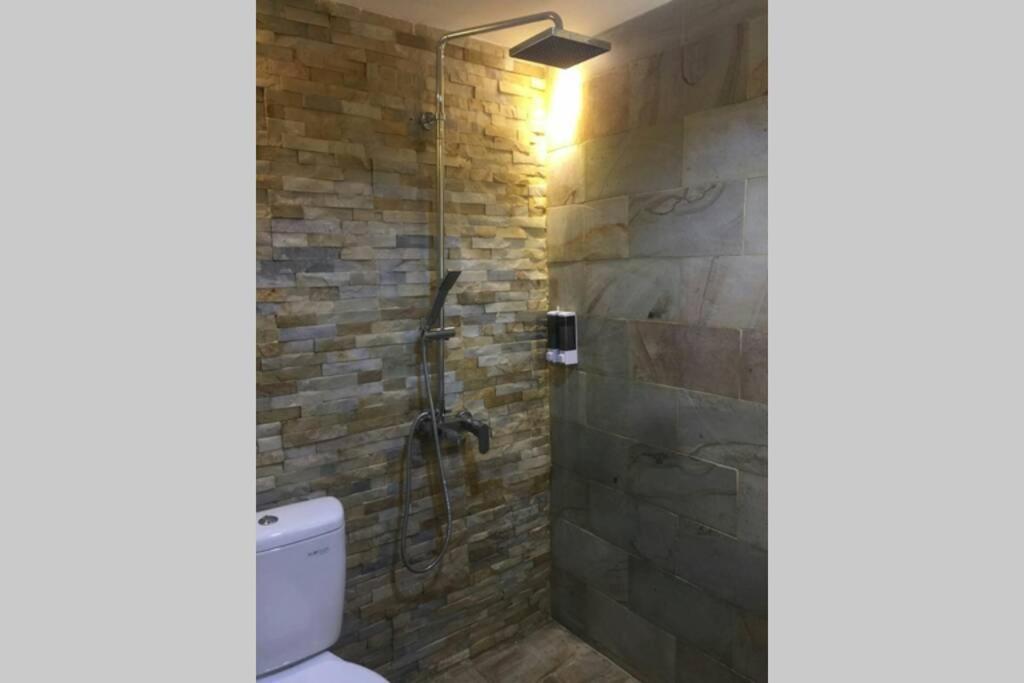 Cosmy Orchard Apartment at Pakuwon Mall with Wifi photo