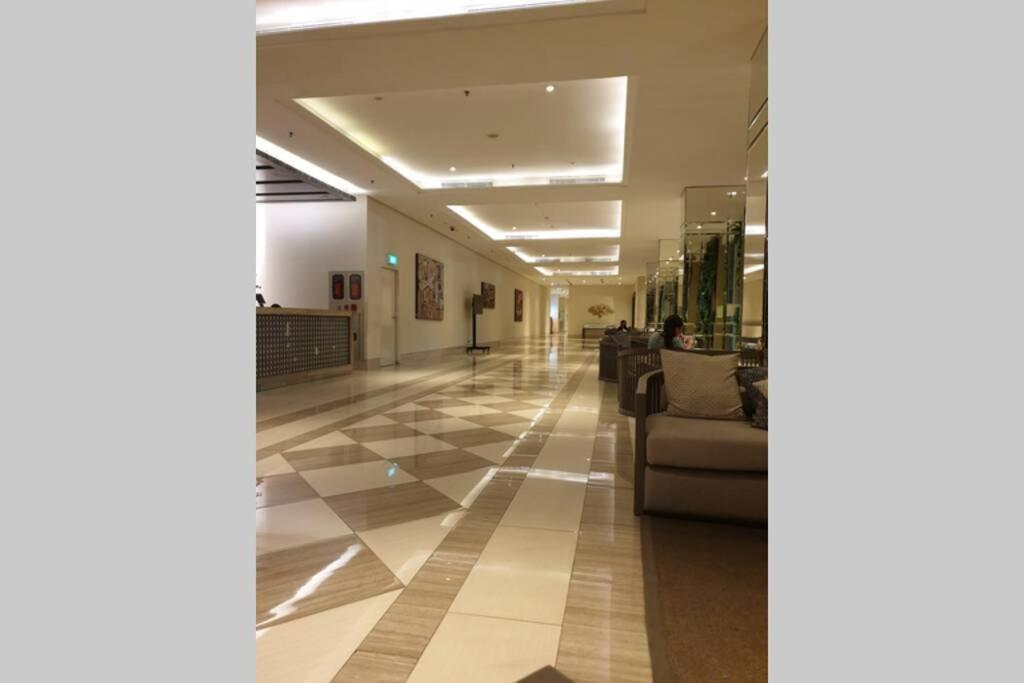 Cosmy Orchard Apartment at Pakuwon Mall with Wifi photo