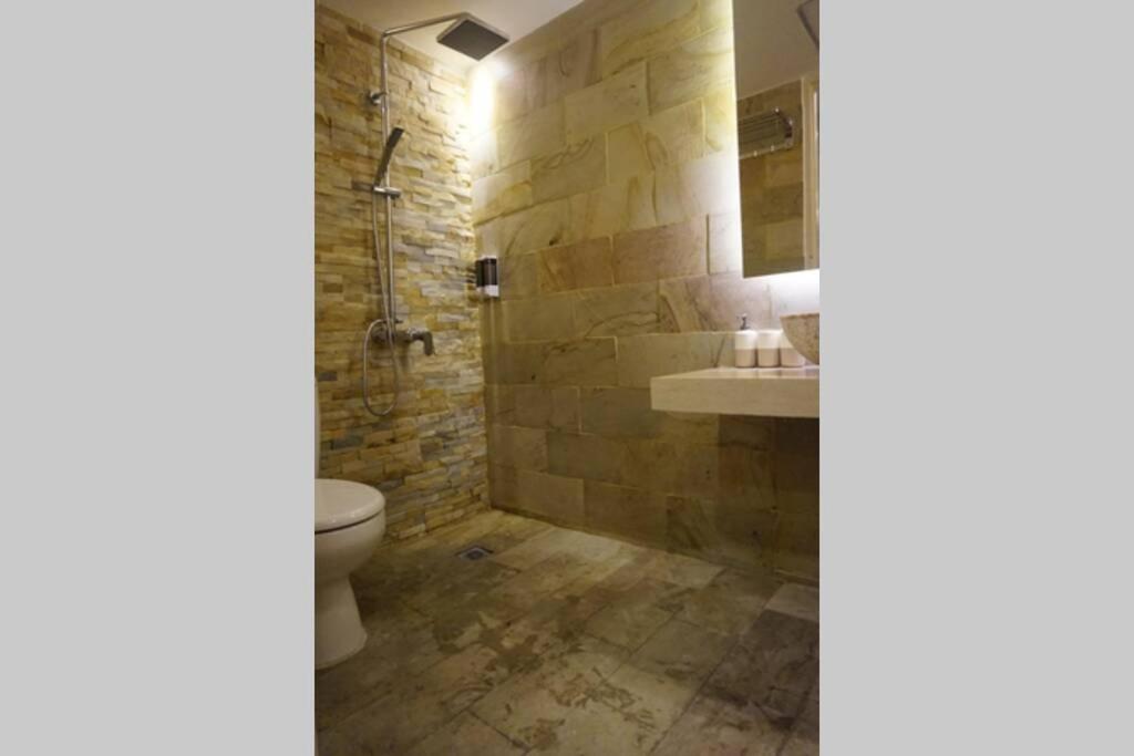 Cosmy Orchard Apartment at Pakuwon Mall with Wifi photo