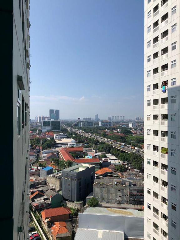 2BR Green Pramuka Apartment photo