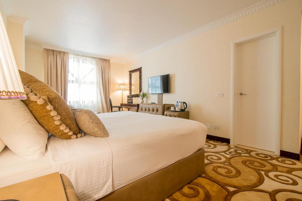 Suites at The Grand Palace Hotel