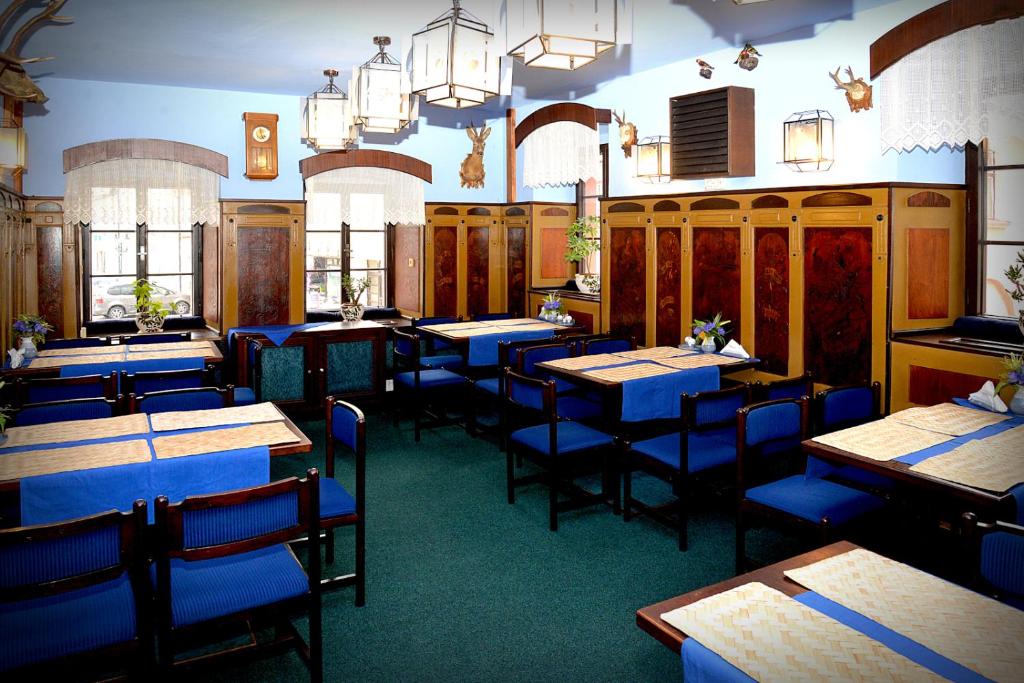 Hotel Zlatá Labuť의 고풍스러운 식당