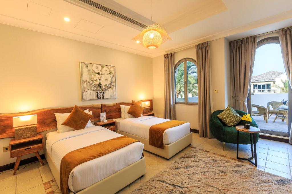 The S Holiday Homes - Stunning 5 Bedrooms Villa at the Palm Jumeirah with Private Beach and Pool photo