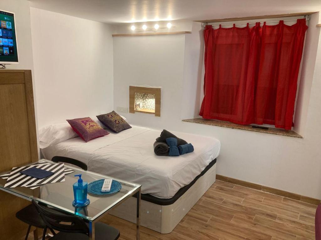 Malagueña Salerosa Apartamento - estudio con terraza En casa típica de 1 a 4 dormitorios, Malaga