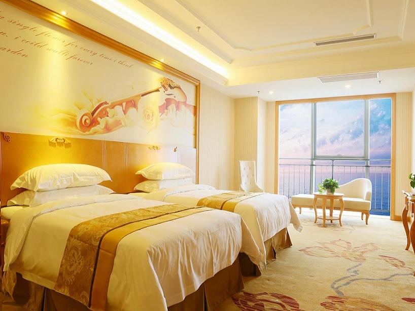 Vienna International Hotel Shandong Yantai FTA Jinshatan Xingyi Square photo