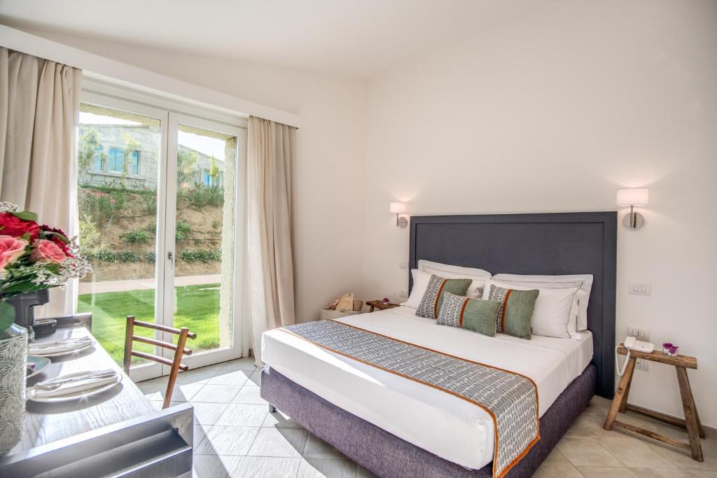 Cala Sinzias Resort — Pokoje in Castiadas, Sardynia