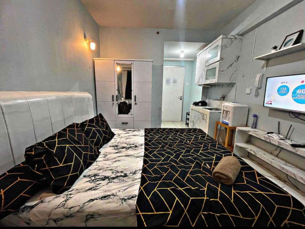 Stylist & Minimalist Studio 1BR Fast WIFI @Green Bay Pluit Apartment photo