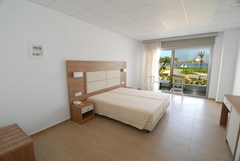 Royal Bay Suites — Hotel rooms in Kefalos, South Aegean
