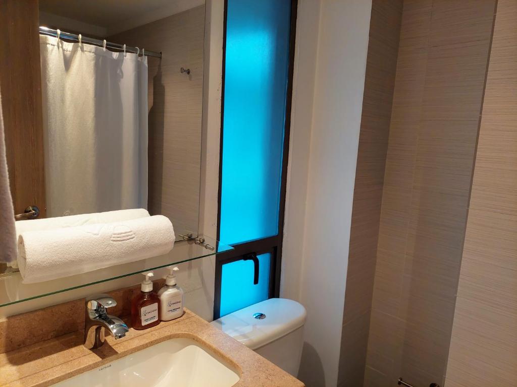 Hotel Viaggio Teleport City Suites photo
