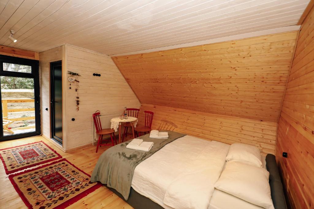 Wooden cottage "green house" in Bakuriani photo