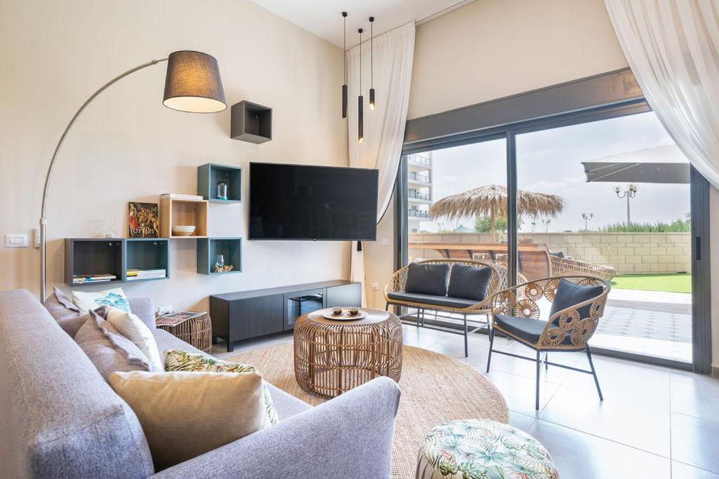 Deluxe 4BR Apt w Terrace 5-min From Beach by Sea N' Rent