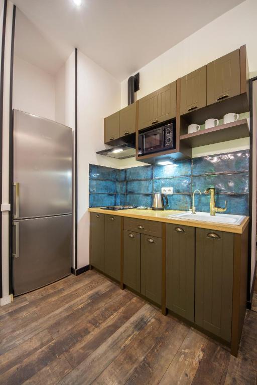 Loft Design Apartments on Desyatynnyi Ln photo