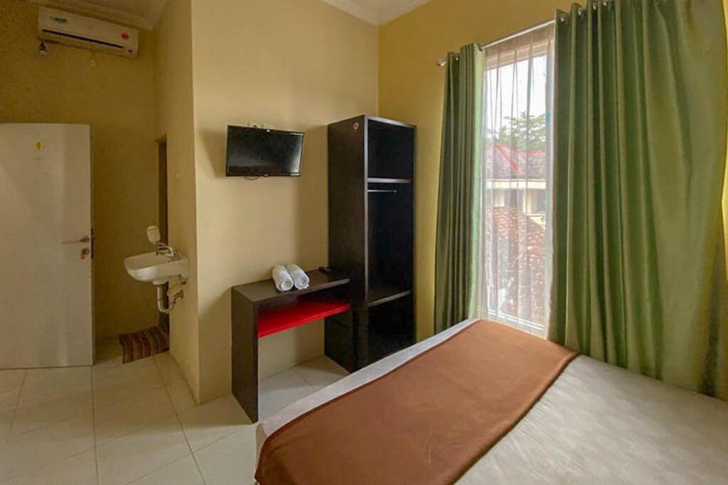 Rama Shinta Homestay RedPartner photo