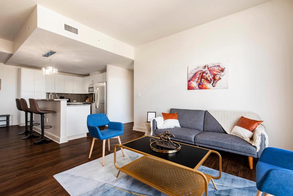 TWO Luxurious Highrises on the same floor by CozySuites