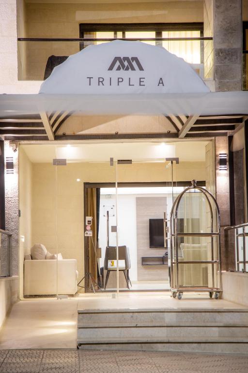 Triple A Hotel Suites photo