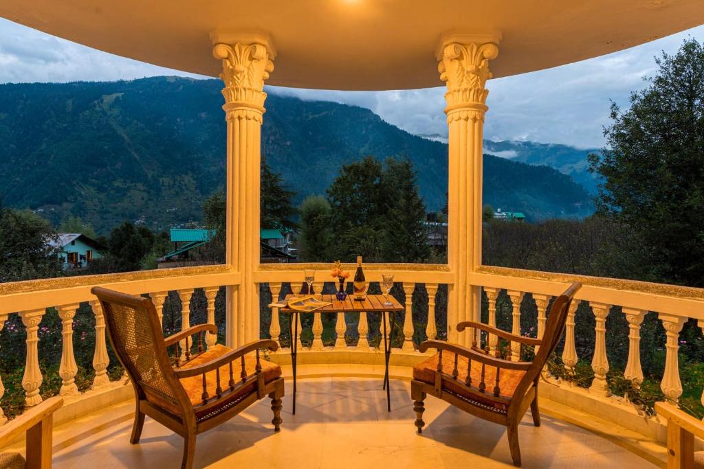 StayVista at The Lama House with huge lawn and valley view photo