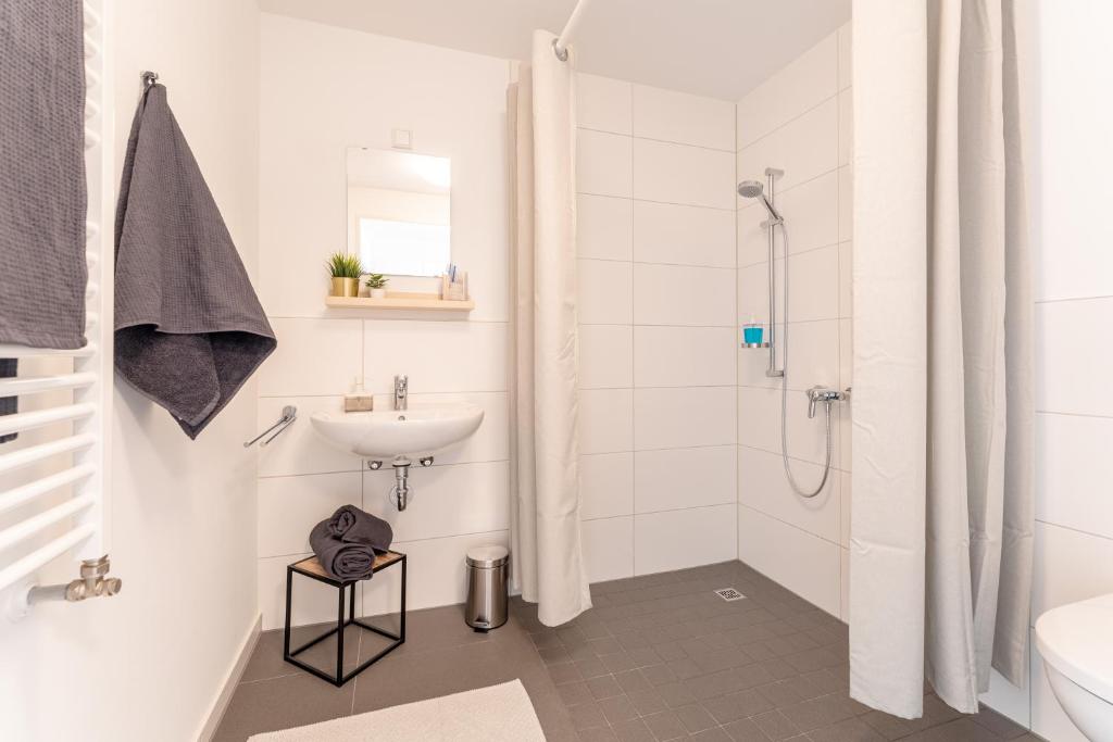 NEU☆Business Apartment☆Messe/Airport☆Tiefgarage photo
