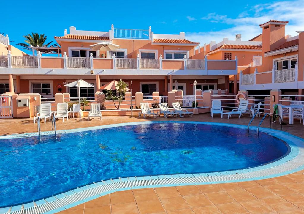 Apartamento funcional en residencial con piscina en inmejorable ubicación en centro de la isla - 1