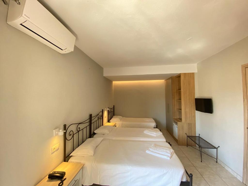 Louvre Hotel — Hotel rooms in Gouvia, Ionian Islands