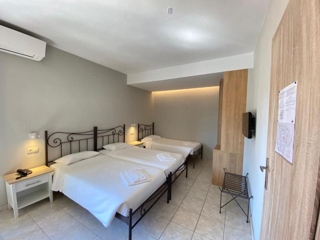 Louvre Hotel — Hotel rooms in Gouvia, Ionian Islands