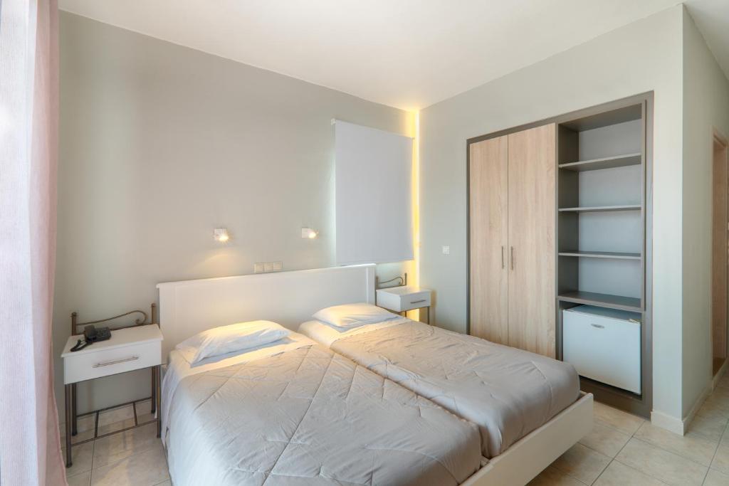Louvre Hotel — Hotel rooms in Gouvia, Ionian Islands