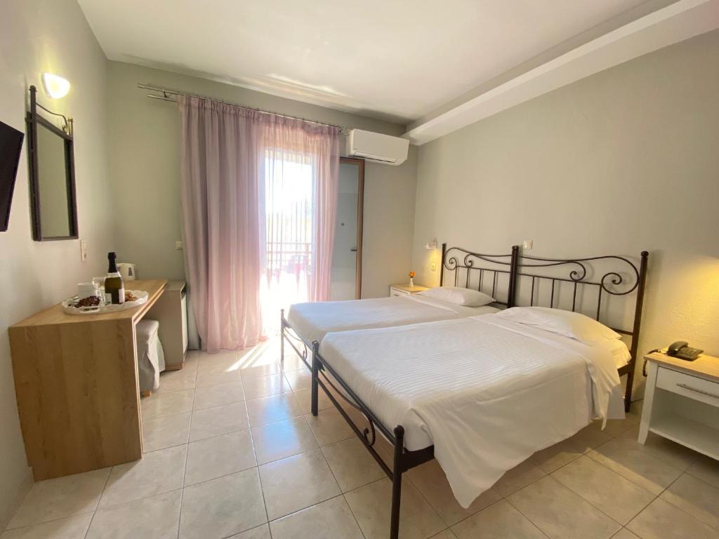 Louvre Hotel — Hotel rooms in Gouvia, Ionian Islands