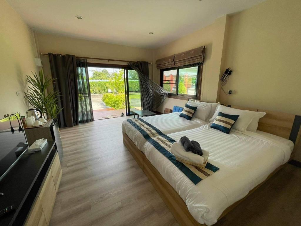 Shared lounge/TV area, QG Resort in Bangkok